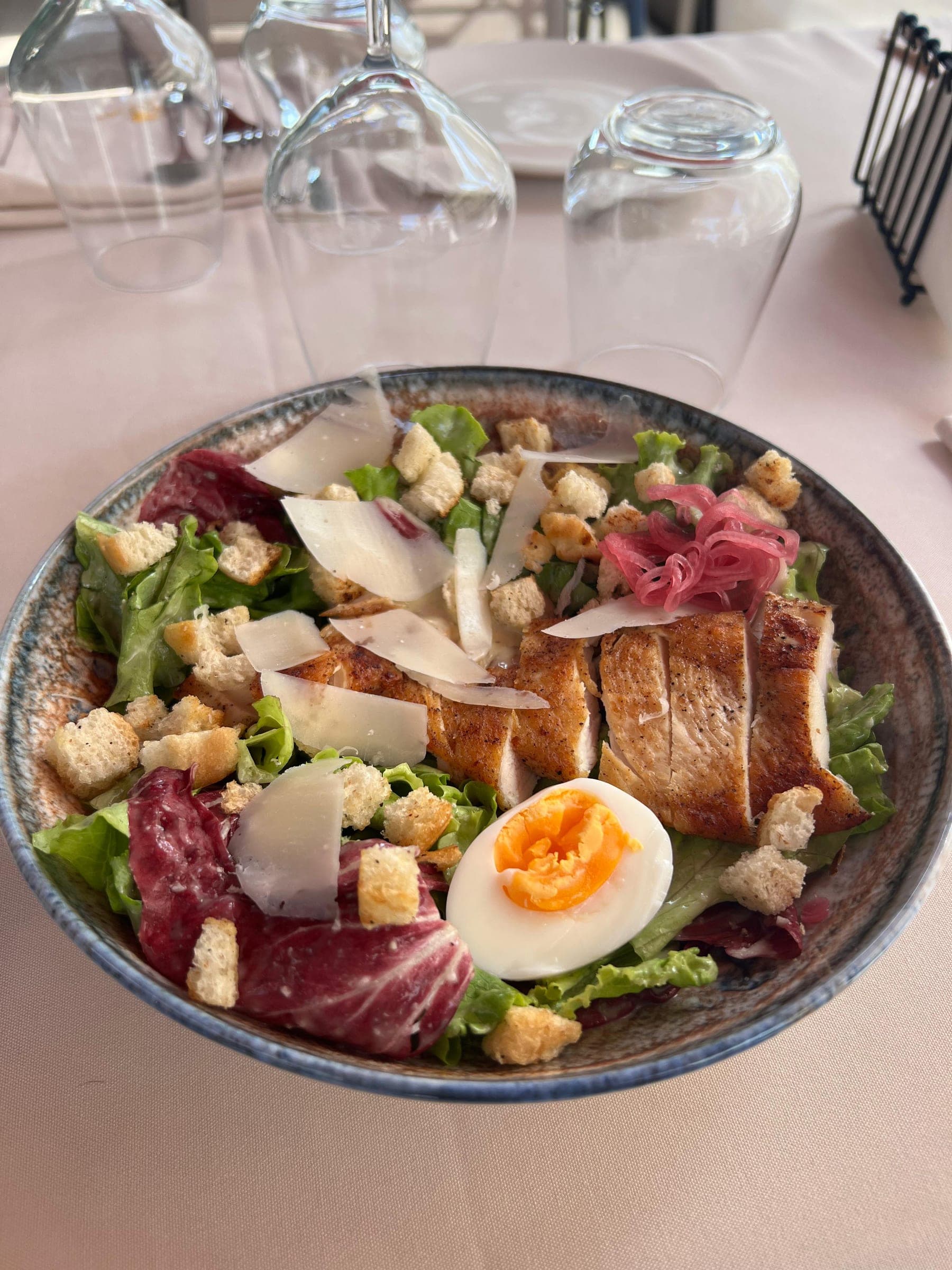 Caesar salad with chicken, parmesan and egg