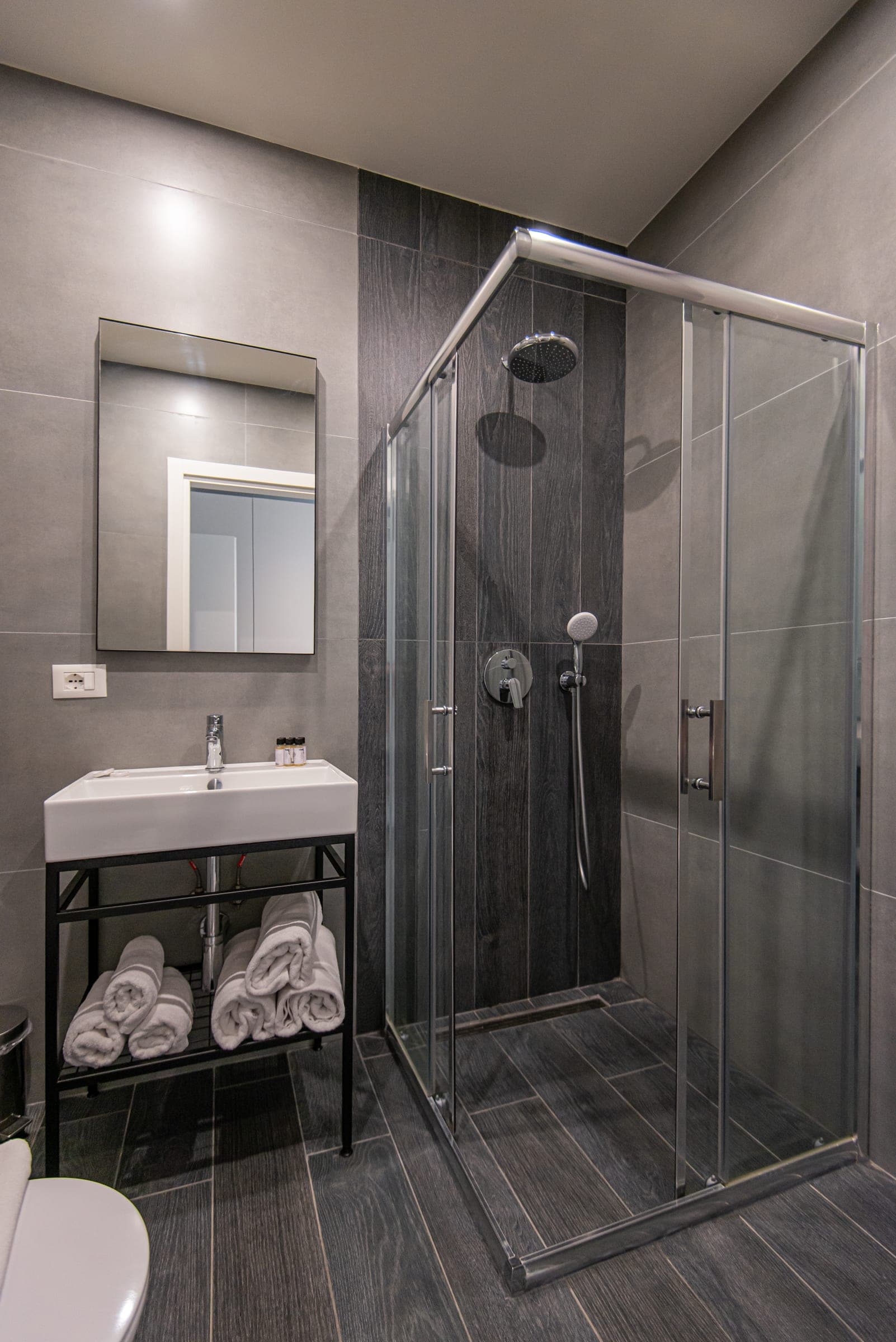 Triple Room bathroom with a glass shower